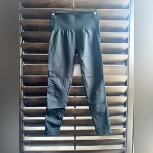 NVGTN Performance seamless legging. Material pull in right butt cheek.